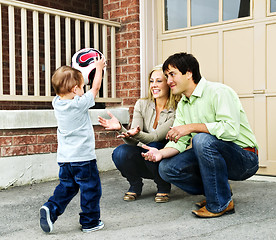 Image showing Family playing with soccer ball