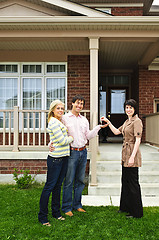 Image showing Happy couple with real estate agent