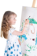 Image showing Little girl painting