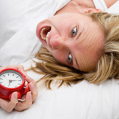 Image showing Woman waking up Late