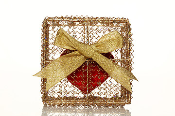 Image showing Red heart in a golden gift box