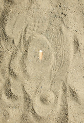 Image showing butt in sand