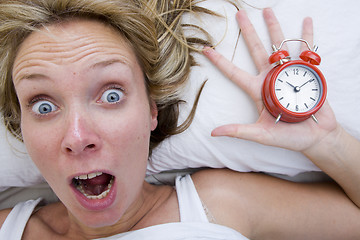 Image showing Woman waking up Late