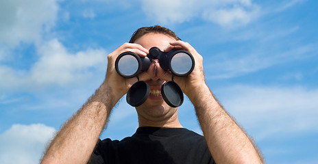 Image showing Man Using Binoculars Outside