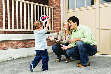 Image showing Family playing with soccer ball