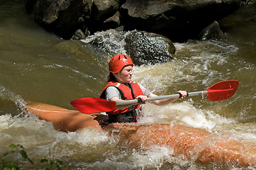 Image showing girl white water kayaking