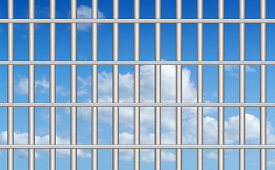 Image showing blue sky through the bars