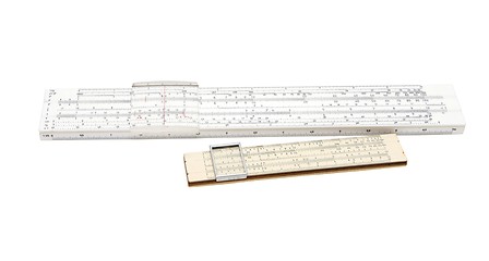 Image showing Two vintage slide rule mechanical calculators isolated