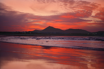 Image showing orange sunset in playa Famara, Lanzarote