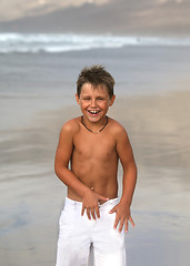 Image showing smiling boy in the towel