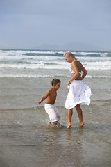 Image showing Happy Mother and son on the beach