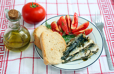 Image showing sardines with tomato and bread
