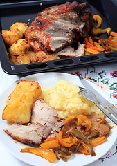 Image showing Roast pork dinner with joint