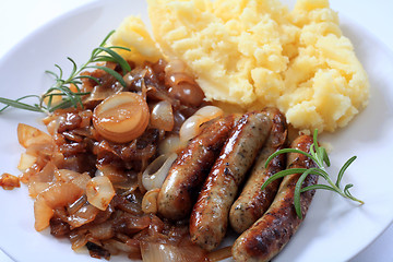 Image showing Sausages fried onions and potato