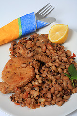 Image showing Pork and beans meal vertical