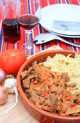 Image showing Beef stroganoff bowl with pasta vertical