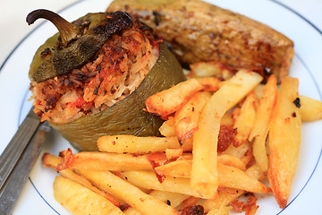 Image showing Stuffed veg and fries