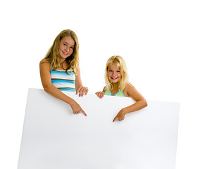 Image showing sister girls with white board