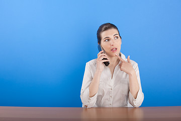 Image showing Businesswoman calling at phone