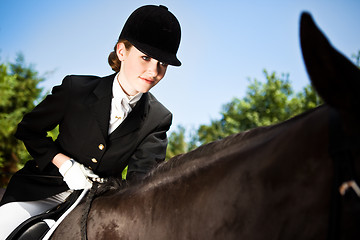 Image showing Horseback riding girl