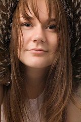 Image showing young woman in fur hat