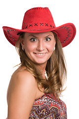 Image showing laughing girl in a red hat