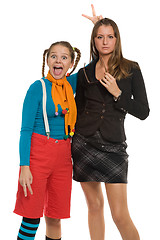 Image showing Ridiculous and serious girls, contrast