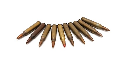 Image showing Arch of spread M16 cartridges isolated 