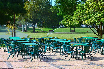 Image showing empty tables in street cafe