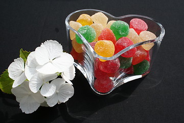 Image showing Candy in lovely glass heart