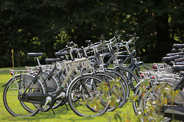 Image showing Many bicycles at Bicycle stand in line