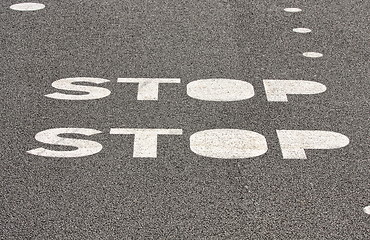 Image showing  stop sign on paved road