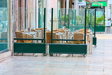 Image showing empty tables in street cafe