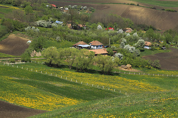 Image showing Romanian vilage between the hills