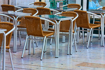 Image showing empty tables in street cafe