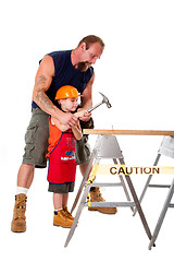 Image showing Father teaching son construction