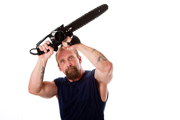 Image showing Crazy guy with chainsaw