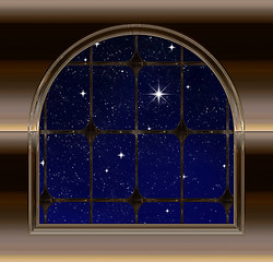 Image showing window looking out to night sky with wishing star