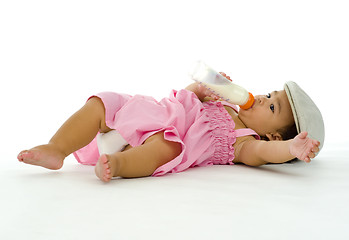 Image showing little girl drinking milk