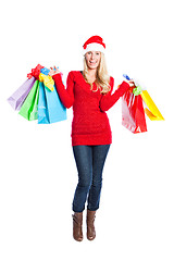 Image showing Christmas shopping santa girl