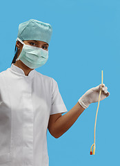 Image showing Nurse holding an urinary catheter