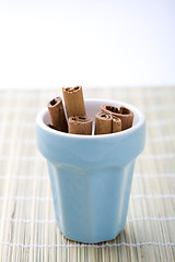 Image showing Cinnamon sticks in a cup.