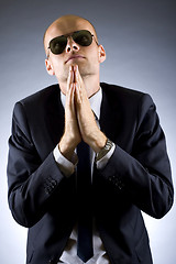 Image showing portrait of businessman praying for success