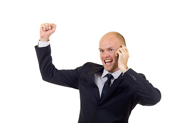 Image showing winning businessman on the phone