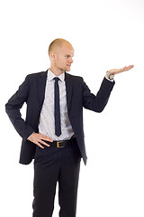 Image showing young cheerful business man giving a presentation