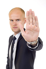 Image showing business man making stop. Focus on the hand