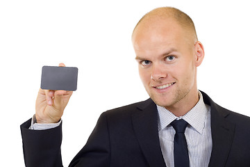 Image showing Businessman handing a blank card