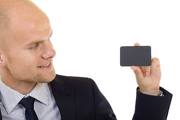 Image showing Business man handing a blank business card