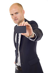 Image showing Business man handing a blank business card