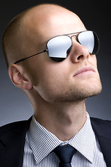 Image showing closeup picture of a businessman with sunglasses